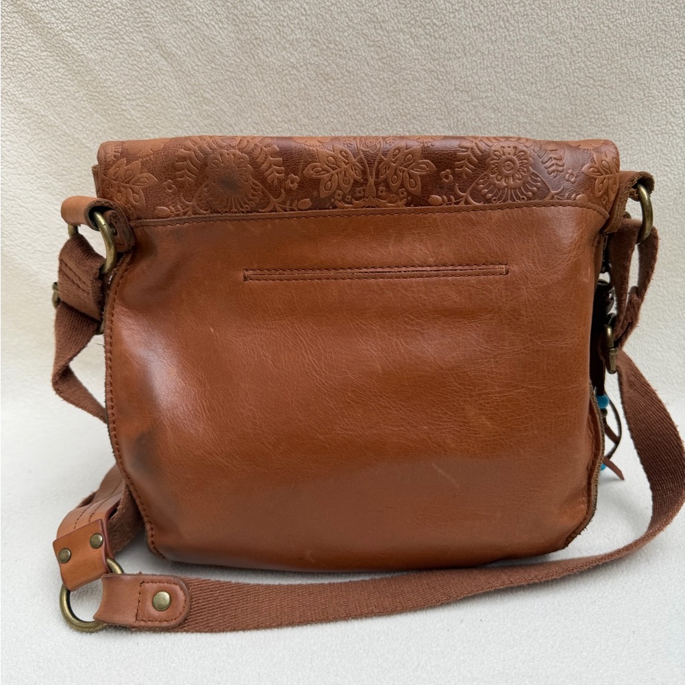 The Sak Silverlake Crossbody Bag in the Tobacco Floral Emboss color. - Picture 5 of 5